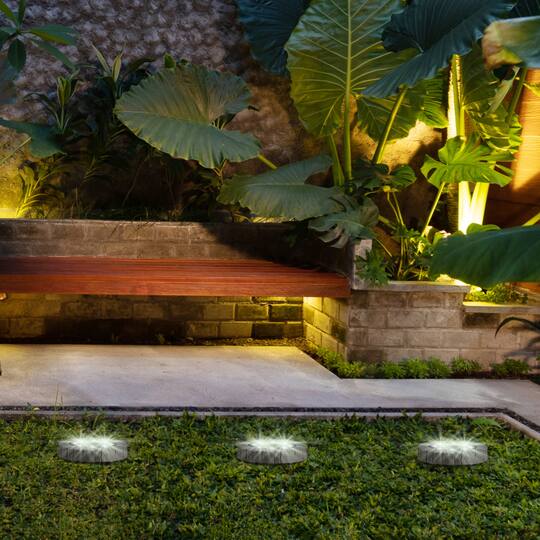 Glitzhome® 5.25" Solar Powered Disk Outdoor Pathway Lights, 4ct.